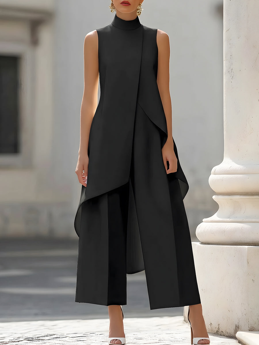 Back view of the navy blue wide-leg jumpsuit, showcasing the clean lines and comfortable fit.