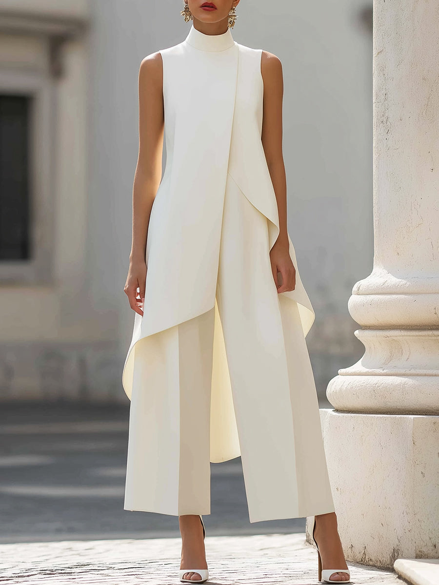 Side profile of the elegant black jumpsuit, highlighting the fluid drape and sophisticated silhouette.