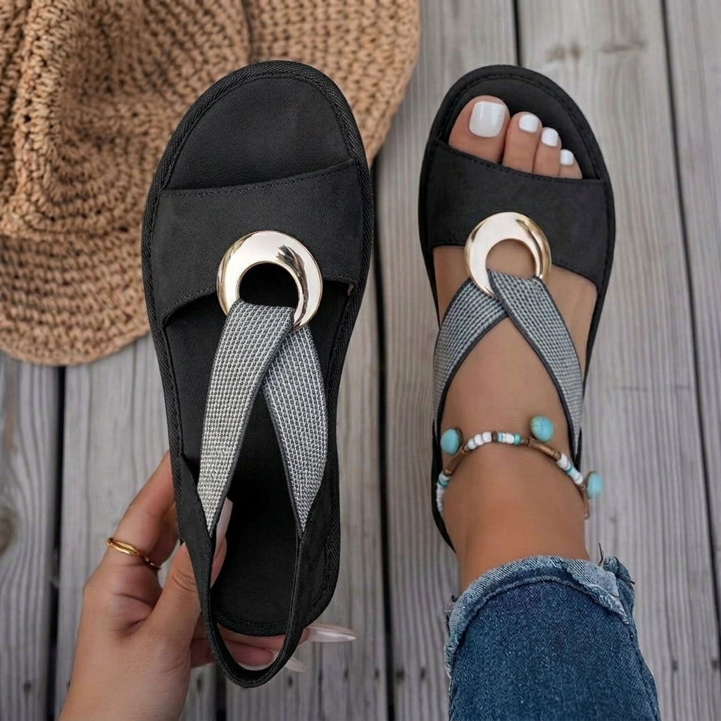 Detail shot of the cushioned ergonomic insole inside the sandals, designed for plantar fasciitis relief.