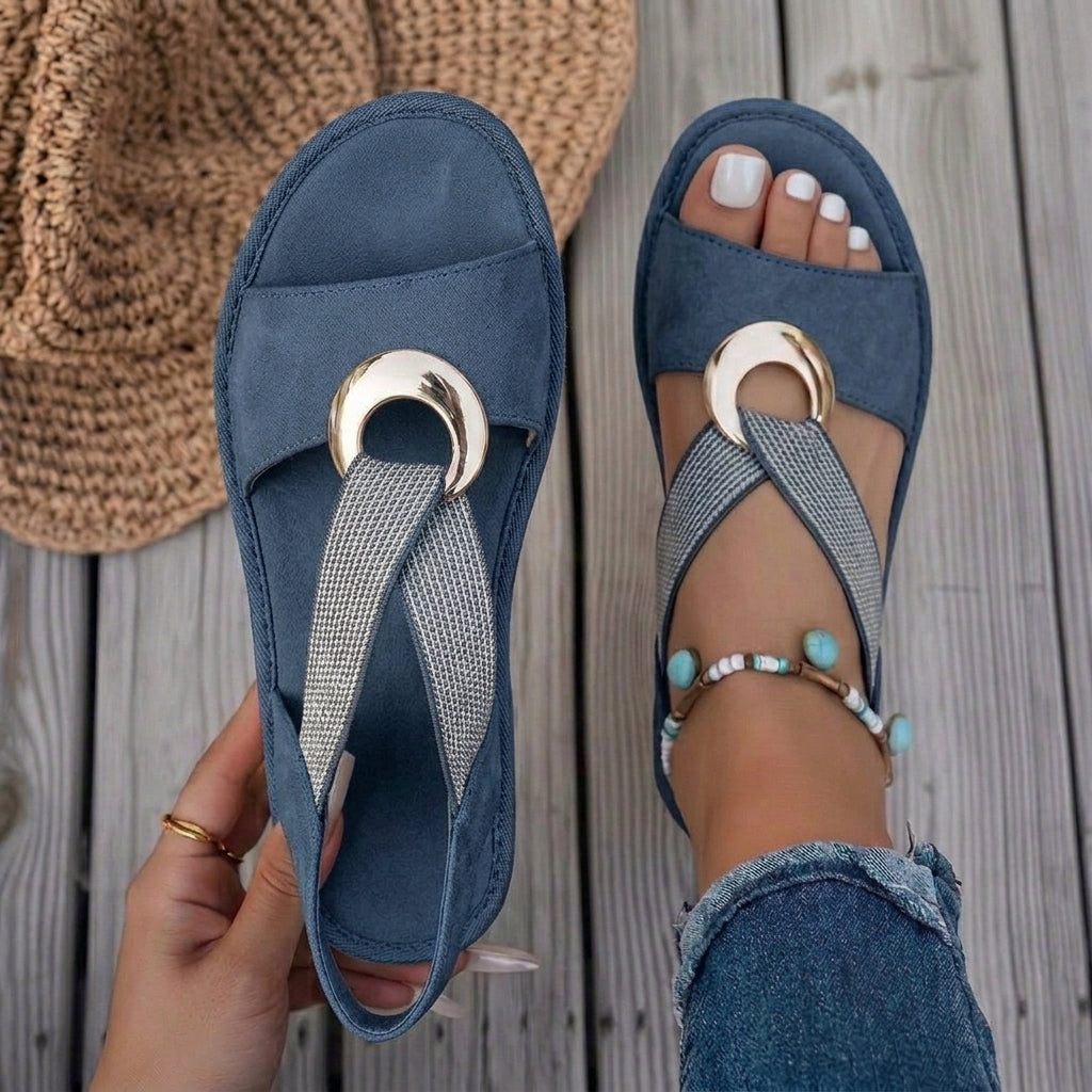Model's feet wearing the stylish beige sandals, showing how the flexible straps adapt to swelling.
